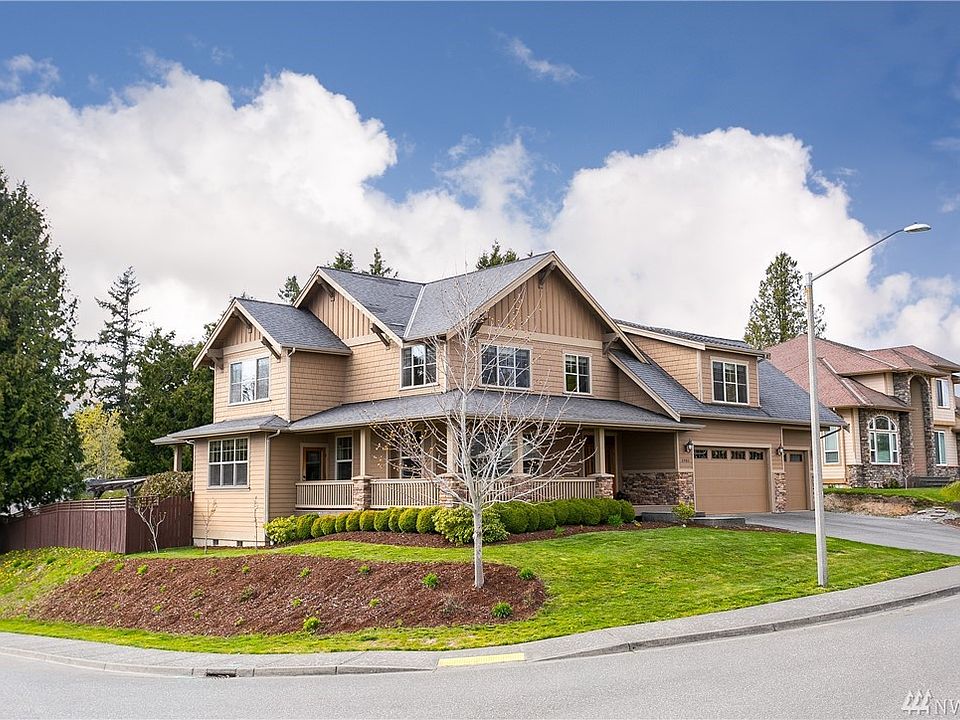 This gracious home is perfectly perched on a 1/4 acre corner lot and is fully fenced.