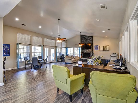 Modern clubhouse with stylish seating, perfect for social gatherings, work-from-home space, or coffee with neighbors.