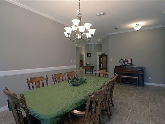  The dining room offers plenty of room for your holiday gatherings and