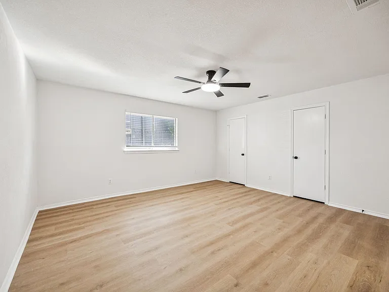 Primary Bedroom with two large closets