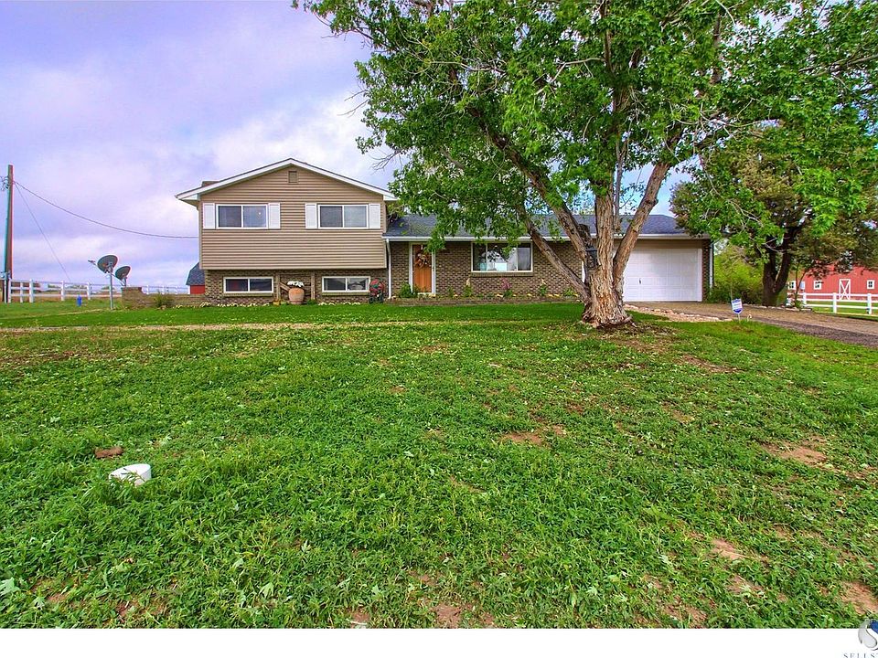 Wonderful private 10 acre ranch with large heated work shop and 8 stall barn backing O'Brien Canal and the new Commerce City Rec Center.  Across the street from Buffalo Run Golf Community and easy access to highways, schools and shopping.