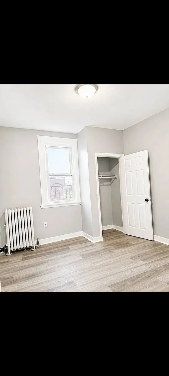 Building Photo - 233 Littleton Ave #12A