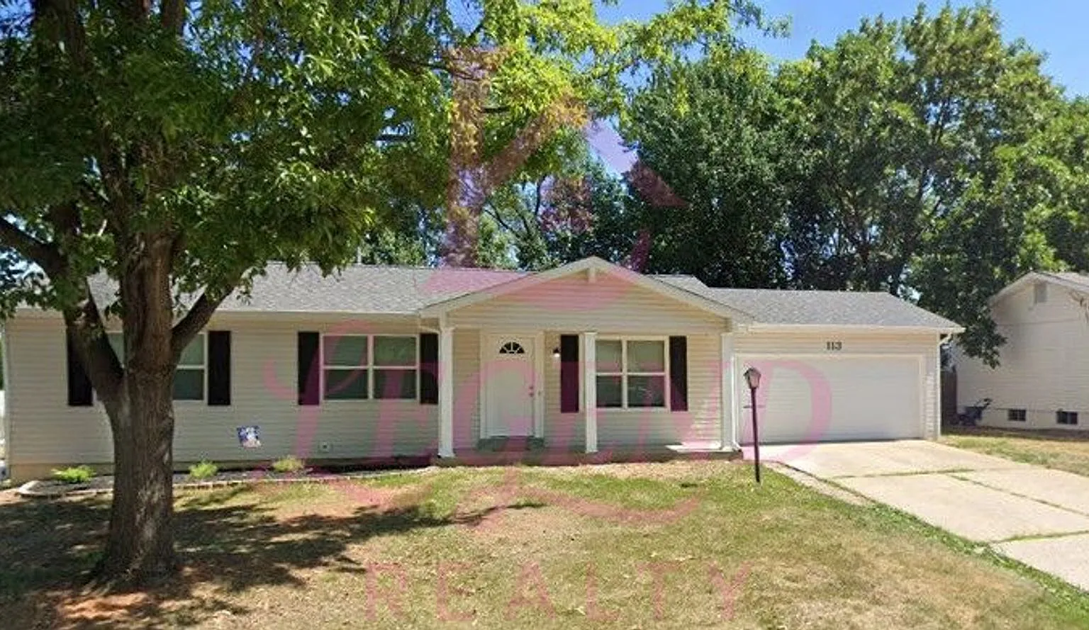 Beautifully Renovated Home on Corner Lot with Finished Walk-Out Basement — Photo 2