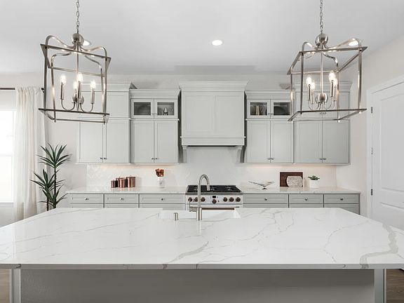 Kitchen with upper glass cabinets