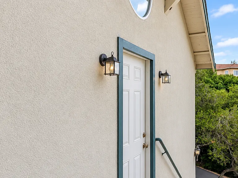Round window above the front door.