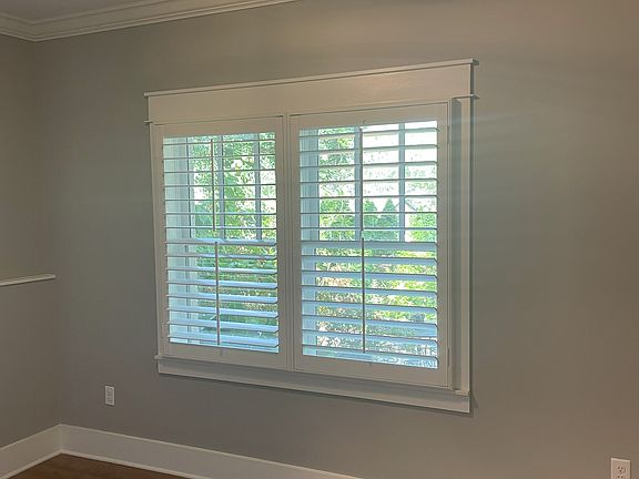 Main bedroom. 104 sf. Plantation shutters for privacy.
