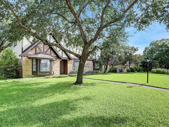 This lovely 2 story home sits on an oversized lot with a 2 car detached garage, a 2 car carport, and a fantastic inground backyard swimming pool.
