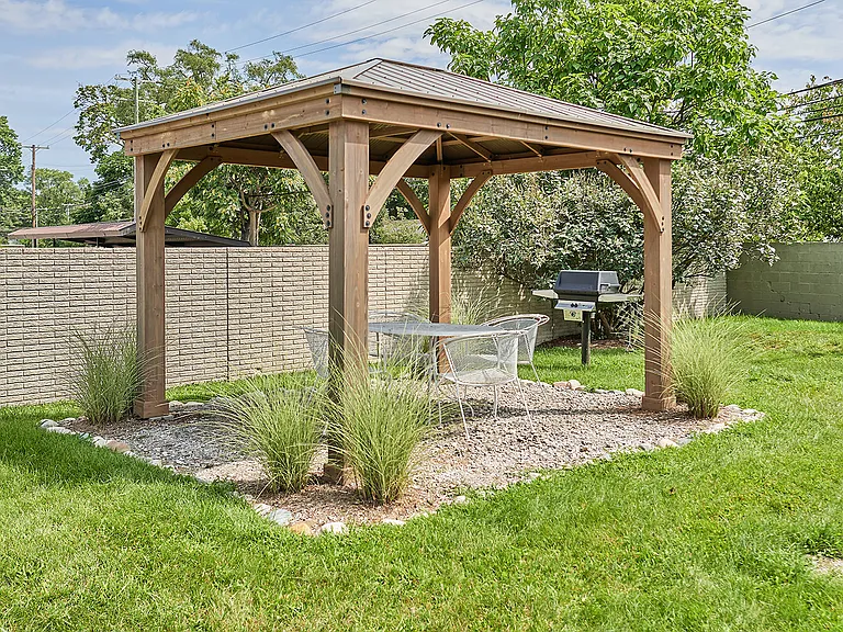outdoor gazebo area with gas grill for tenant use