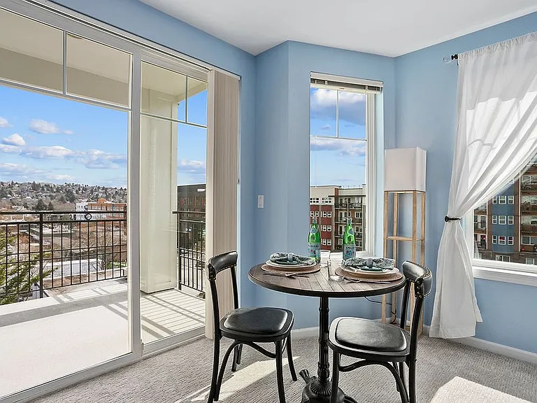 Lots of natural light in the dining and living areas along with the covered porch