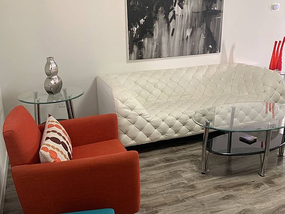 Lots of comfortable seating in the living room.