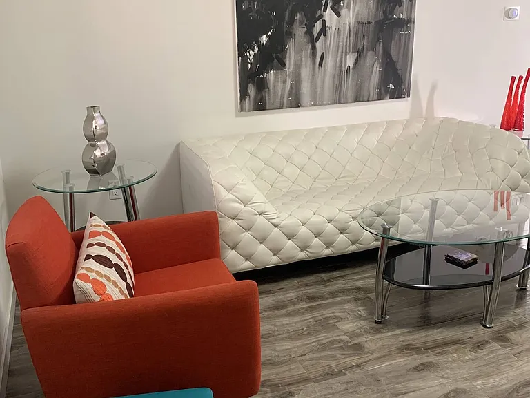 Lots of comfortable seating in the living room.