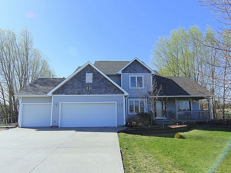 Main View of Home with Wide Driveway