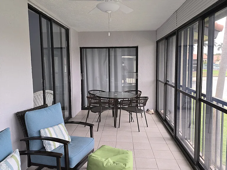 Veranda with seating and dining table