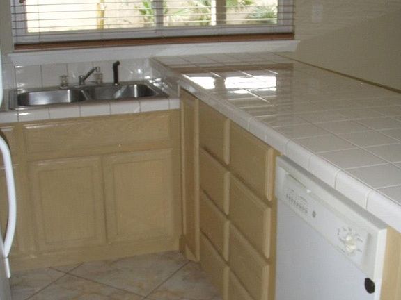 ALL WOODEN CABINETS AND DISHWASHER