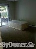 Master bedroom : walk out onto patio. nice view of backyard