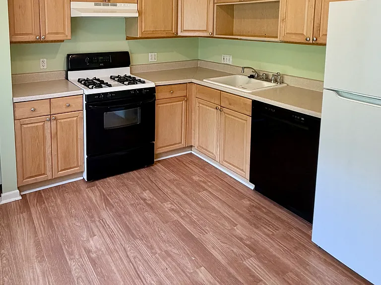 Kitchen with maple wood cabinets