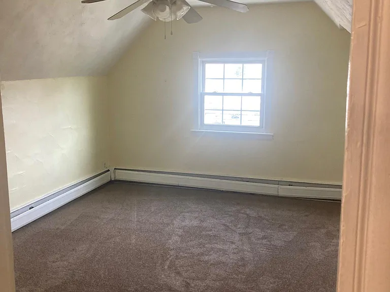 Bedroom, fresh paint and new carpeting.
