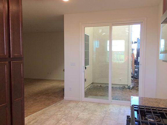 Living room to left....sliding doors to a patio.