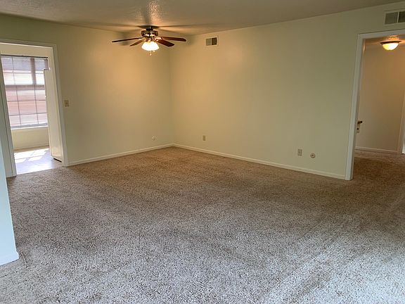 Generous eating area with nice ceiling fan/light.