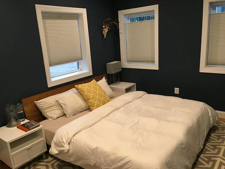 Master bedroom with King-size bed & 2 nightstands