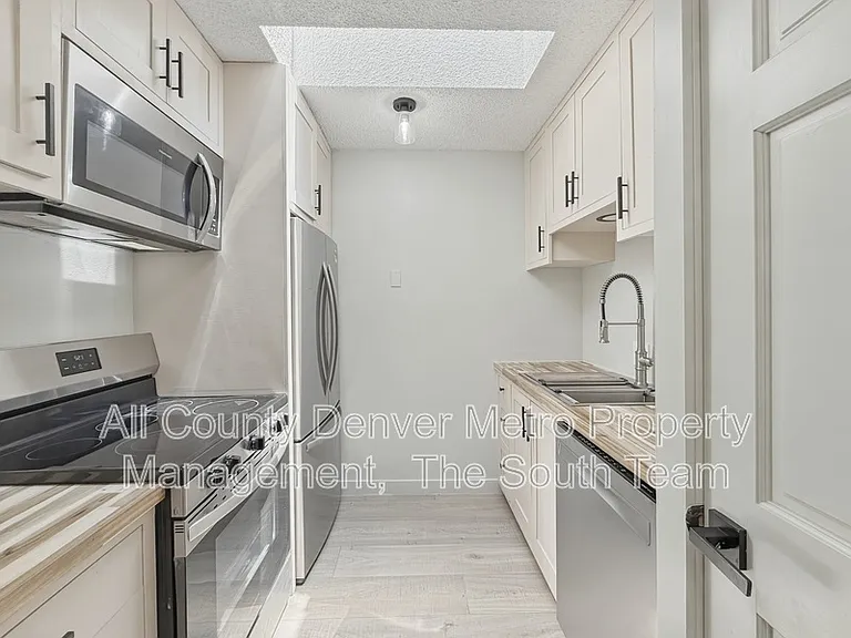 2835 S Monaco Pkwy #1-308 — Photo 4