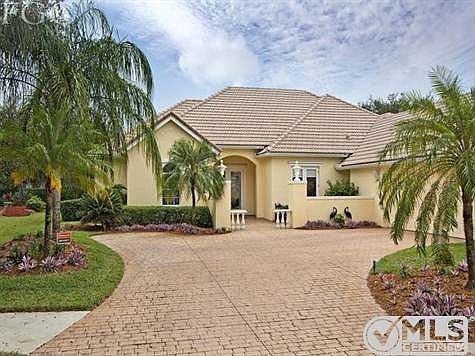 Front- Paver Driveway, Side-entry Garage, Tile Roof, Big Side Yard