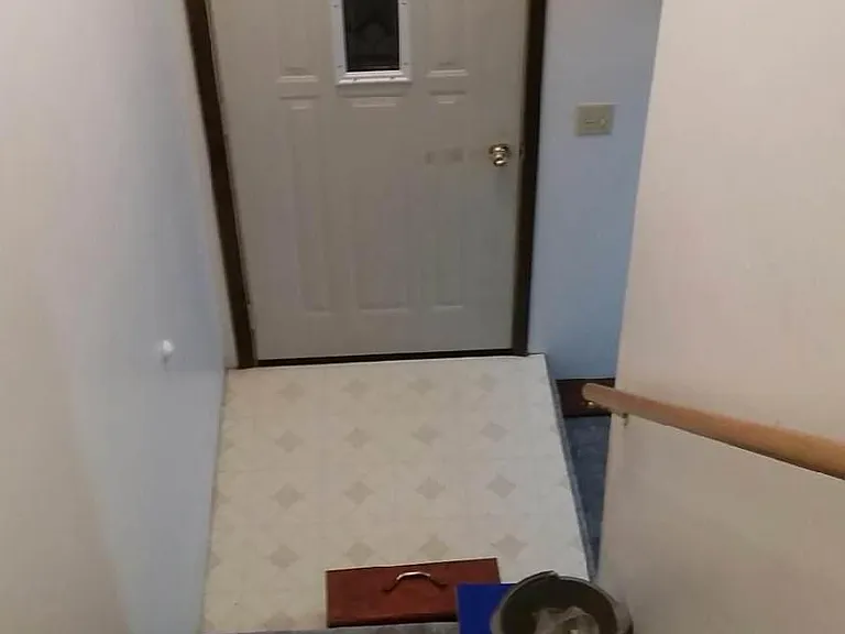 stairway,main front door entrance. view from top of stairs