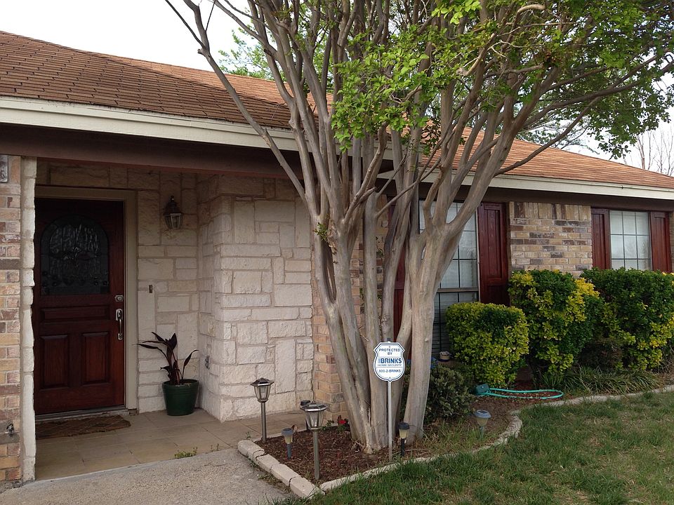 Front door with natural stones.