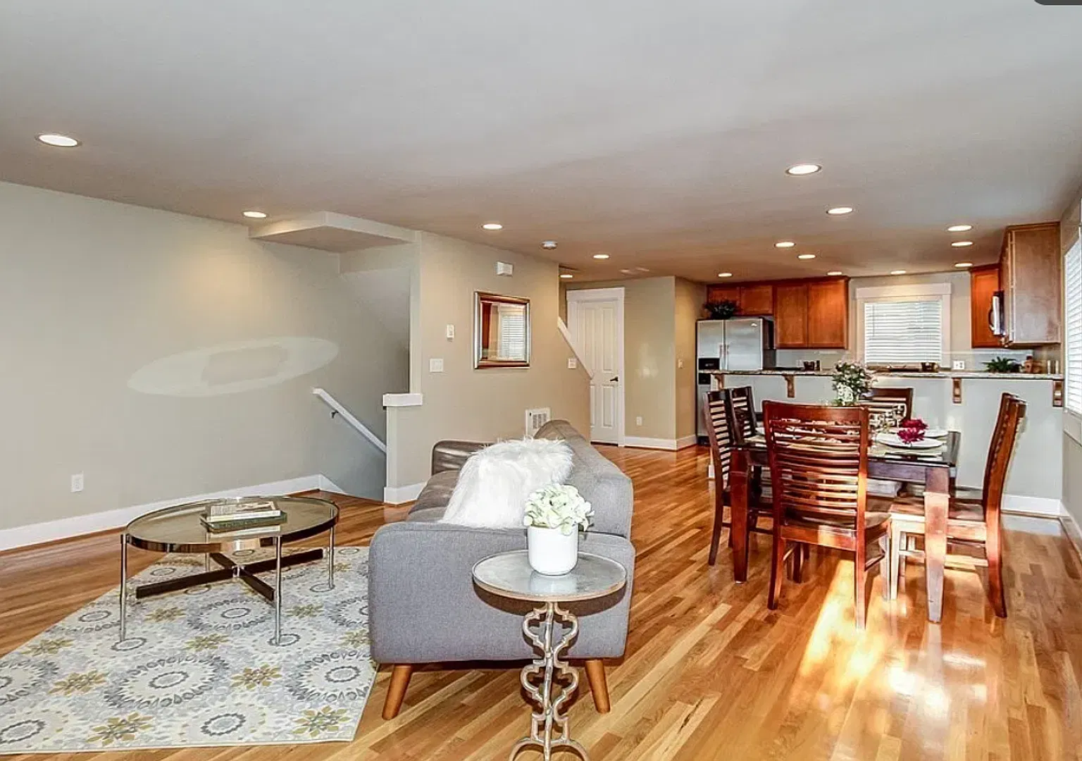 Updated Central District Townhouse with Attached Garage & Private Yard! — Photo 1