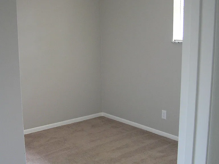 Second Bedroom: W 8'9" x L 11'11" = 104sq. ft
One of three