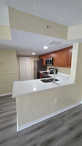 5051 Wiles Rd #201 Photo 1