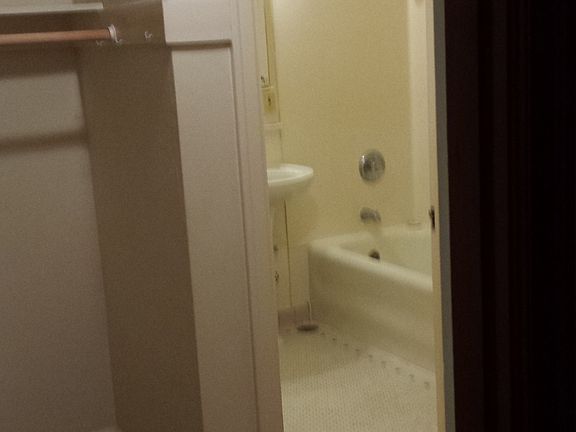 Walk In Closet to Bathroom