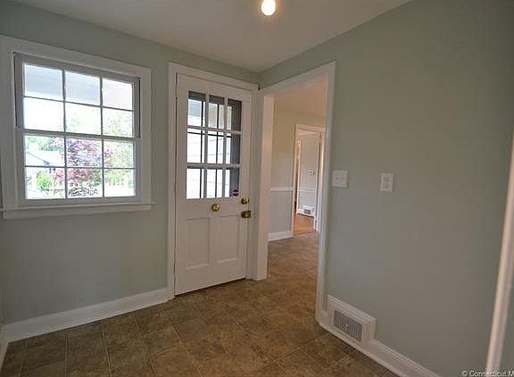 Nicely sized mud room with ...