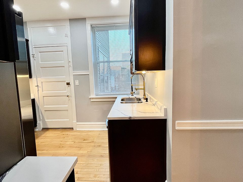 New Kitchen! & Back Door (Leading To Enclosed Back Porch)