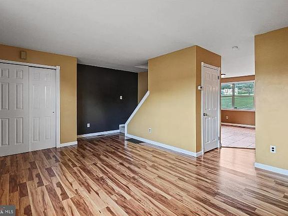 Living room facing dining area