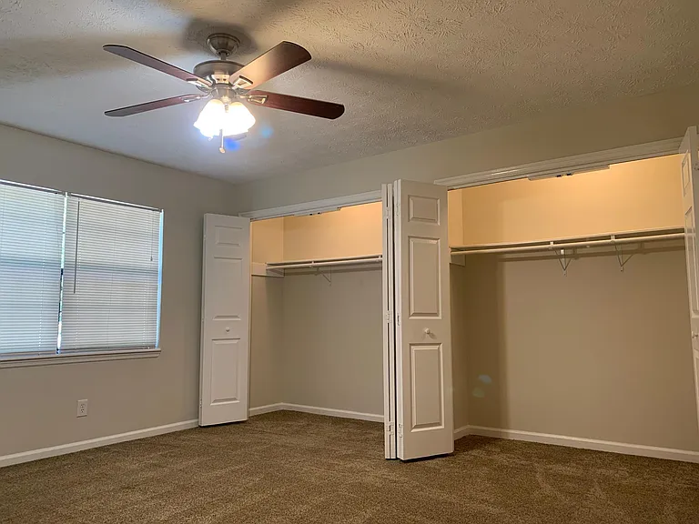 1st bedroom: Tons of natural light, huge closets, and premium carpet and padding.