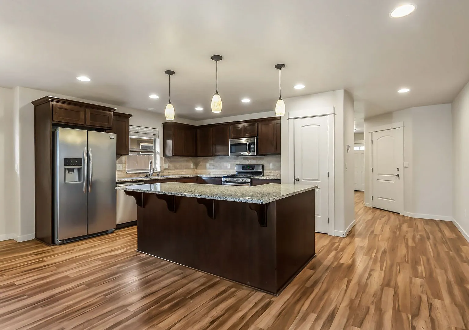4 Bedroom Home: Fenced Backyard & Great Location! — Photo 2