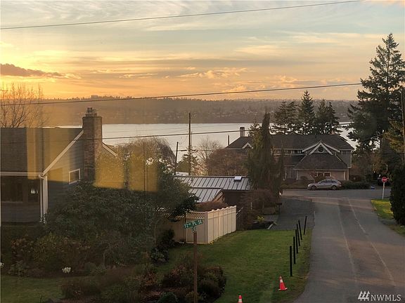 Western exposure and pretty view of Lake Washington.  Very nice light and the feeling of open-space make this a wonderful opportunity for a custom quality RKK Construction home.