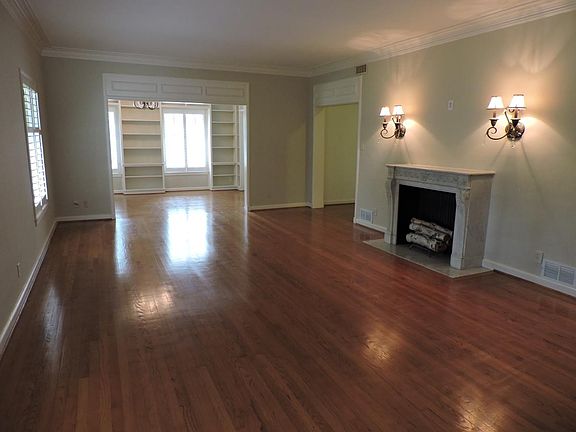 Large Living Room and Marble Fireplace