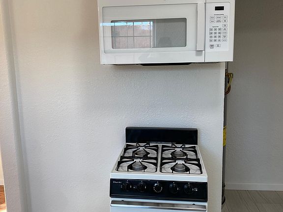 Stove and microwave included.