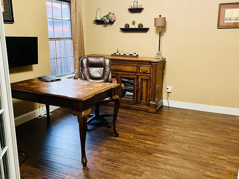 Office has a door to the backyard