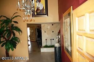 Foyer. Travertine Floors Custom Paint