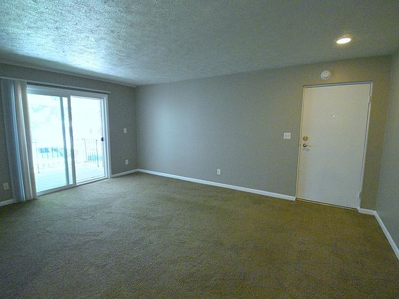 Living Room with Balcony Access