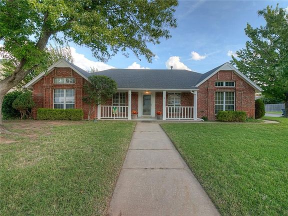 Darling home.  Wonderful front porch to sit and invite friends to come and chat.