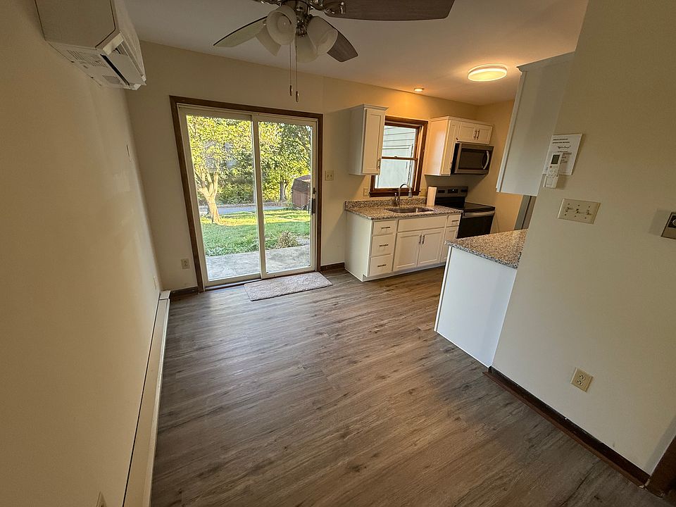 Walk into this brand new kitchen featuring new cabinetry, flooring, granite countertops, and stainless steel appliances