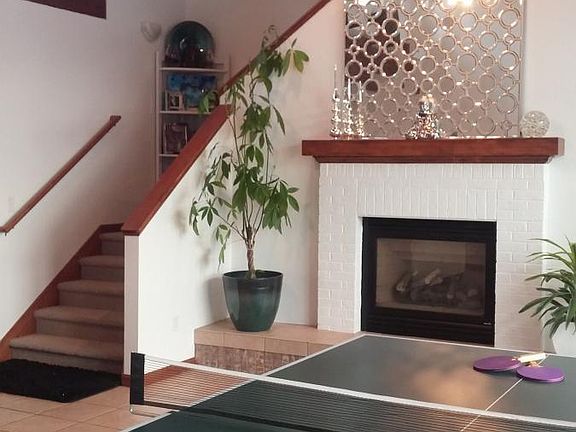 Great room stairs leading to Master Suite