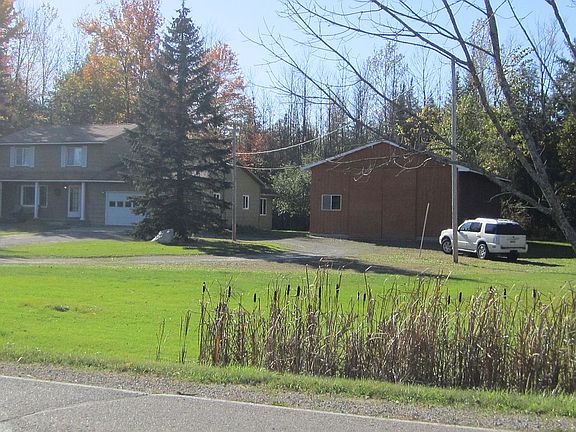 House & Pole Barn on 4 lots.