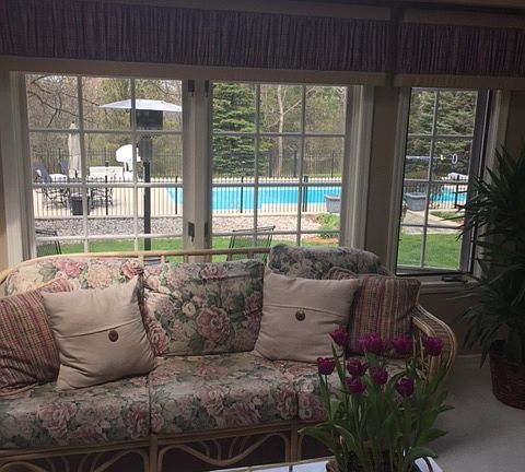 Sun room overlooking pool