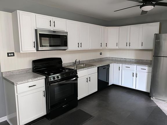4th image of 9407 Elm Ave