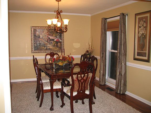 Dining Room - boast new lighting, new flooring, just painted!